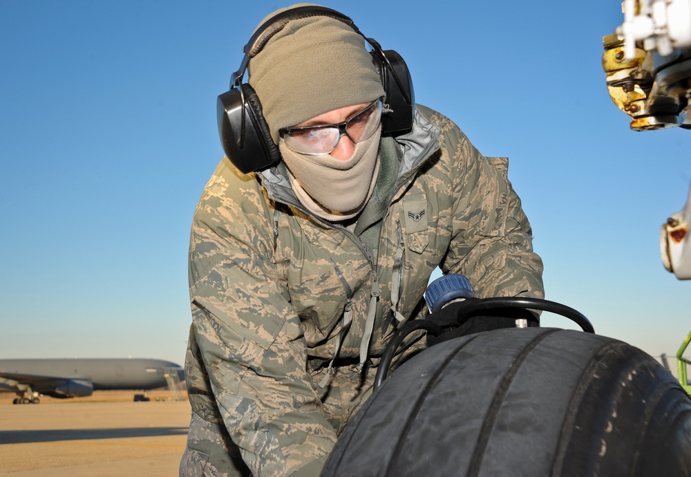 305th Maintenance Group airmen at work