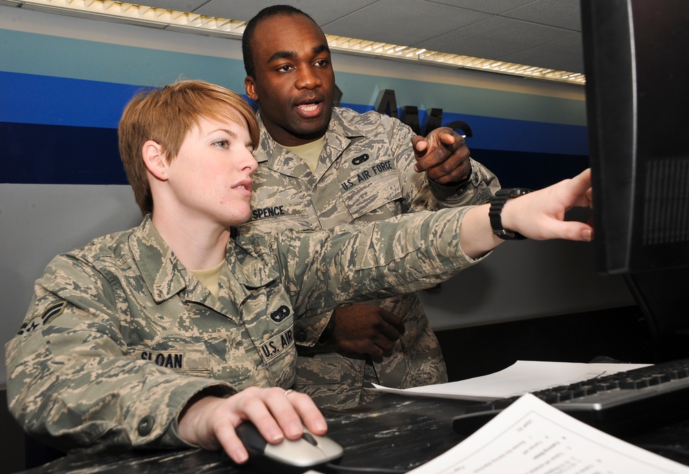 305th Maintenance Group airmen at work