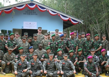 Multinational project builds school