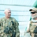 US and Afghan soldiers provide security during agriculture inspection