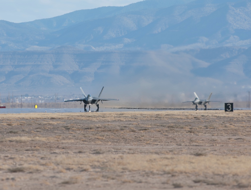 F-22 Raptors take offs