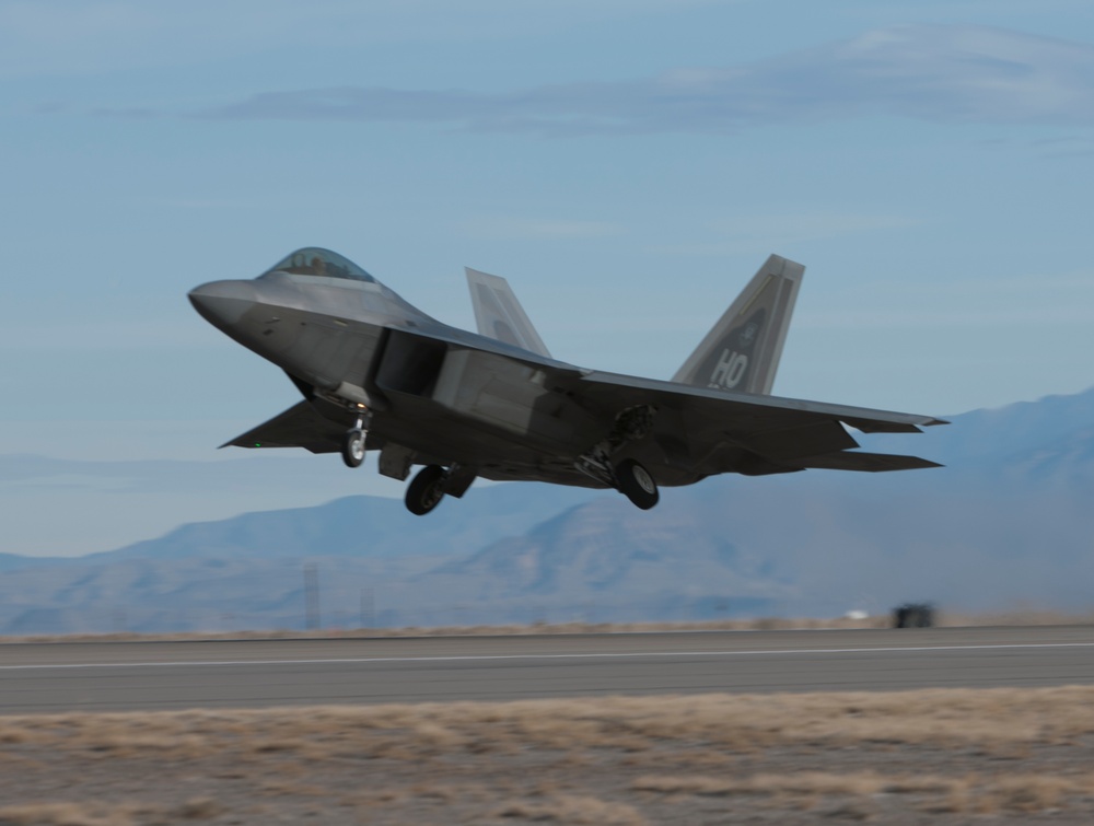 F-22 Raptors take offs