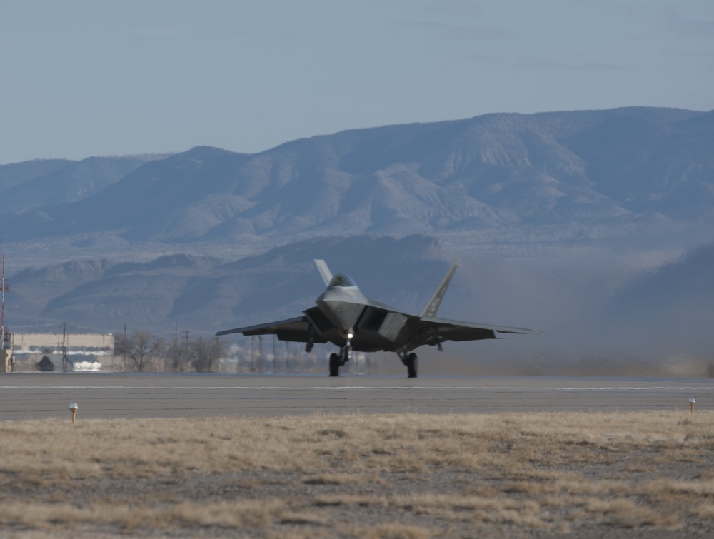 F-22 Raptors take offs