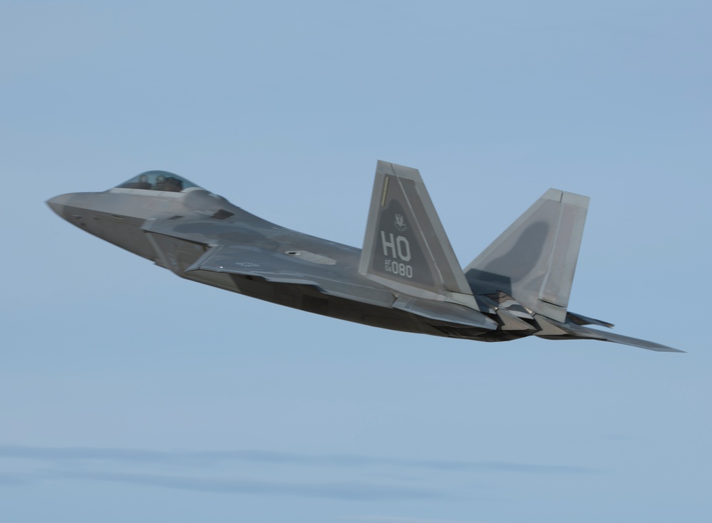 F-22 Raptors take offs