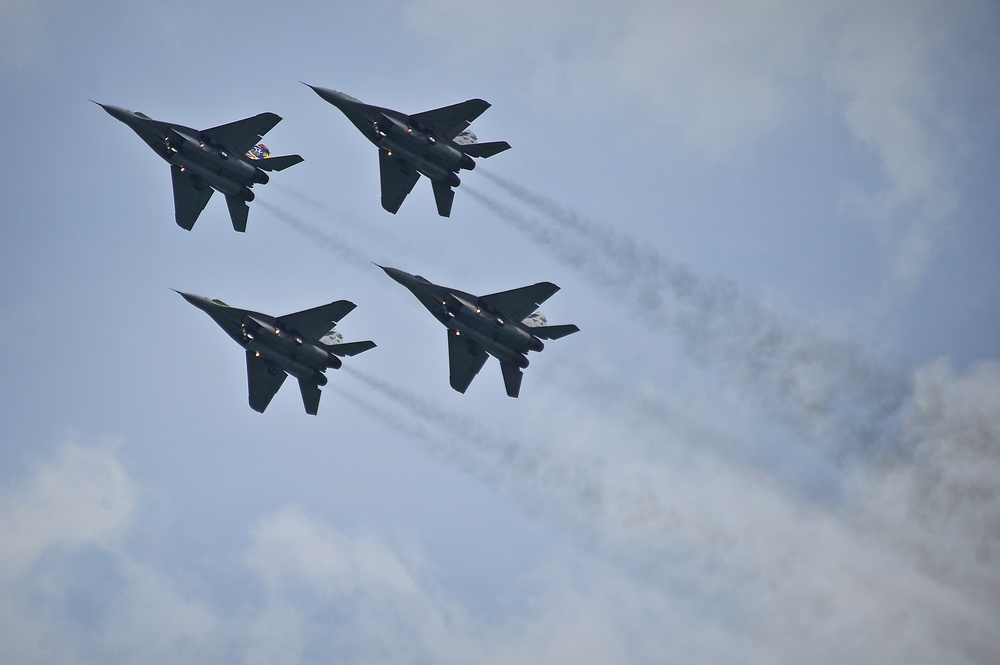 Royal Malaysian Air Force MiG-29's show off during the 2012 Singapore Airshow