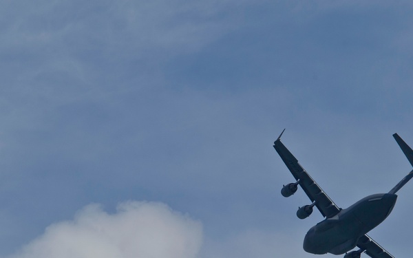Pacific Air Forces C-17 Demonstration Team performs during the 2012 Singapore Airshow
