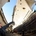 Sailors view USS Ronald Reagan from dry dock