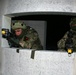 Multinational forces bury their tracks along the snow-covered 'Black Forest' region of Bavaria