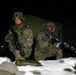 Multinational forces bury their tracks along the snow-covered 'Black Forest' region of Bavaria