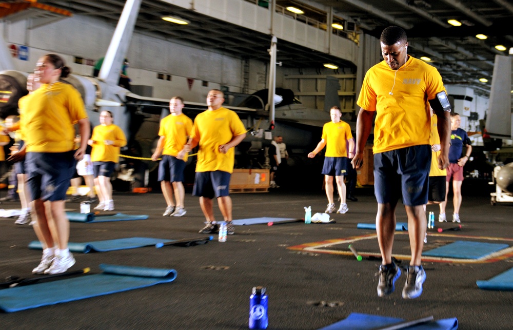 Physical training session aboard USS Abraham Lincoln