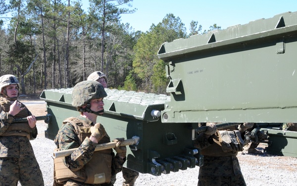 Seabees and Marines build bridges at Camp Lejeune