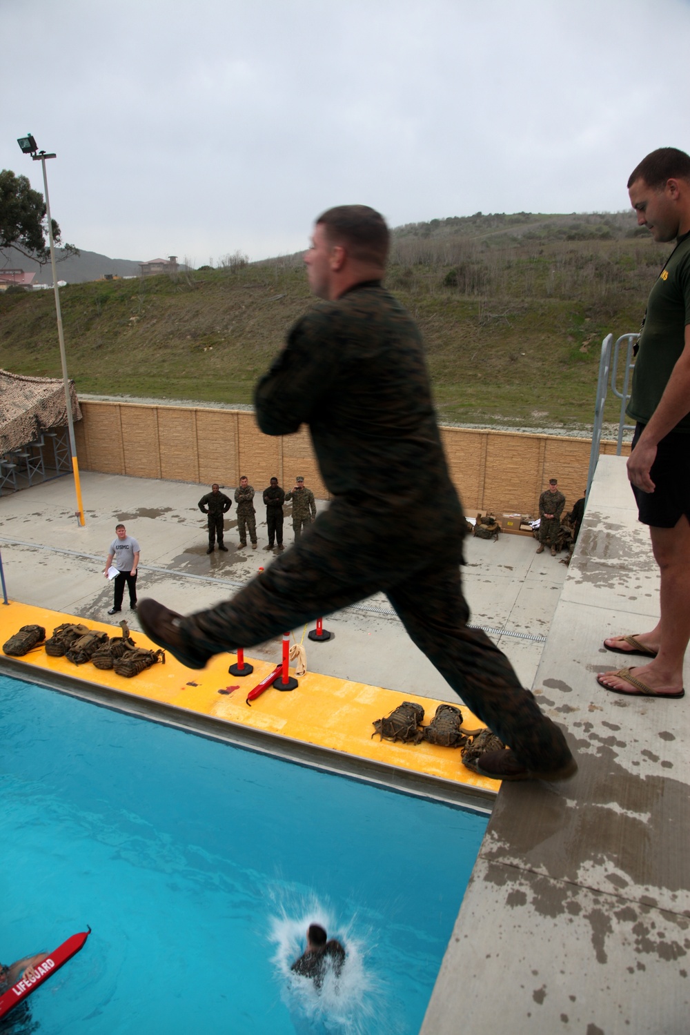 Leap of faith: Military policemen enhance water survival skills