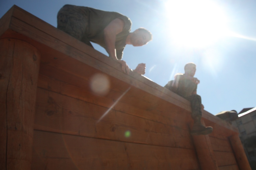 Service Company Marines attack obstacle course