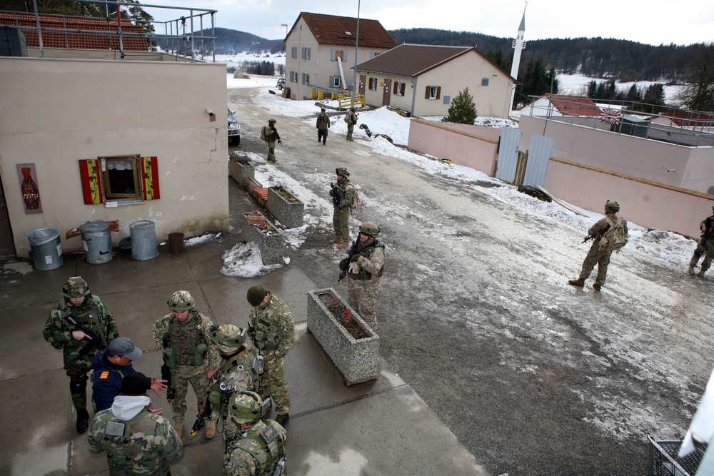 Marines observe Georgian’s Charlie Company 23rd LIB raid enemy insurgents at rehearsal exercise