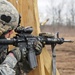 Deploying Security Force Assistance Team Soldier fires M4 carbine