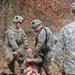 Deploying Security Force Assistance Team conducts care under fire training during stress shoot
