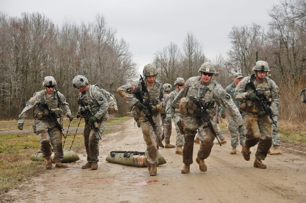 Deploying Security Force Assistance Team conduct evacuation procedures during stress shoot training exercise
