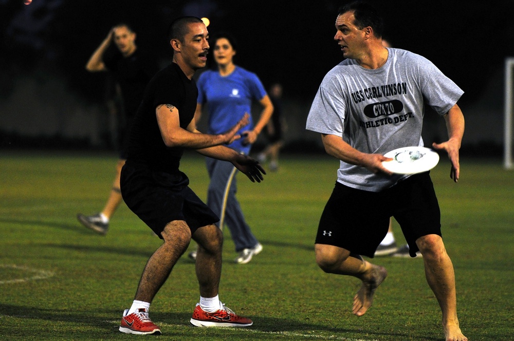 Sailors play Frisbee in Dubai