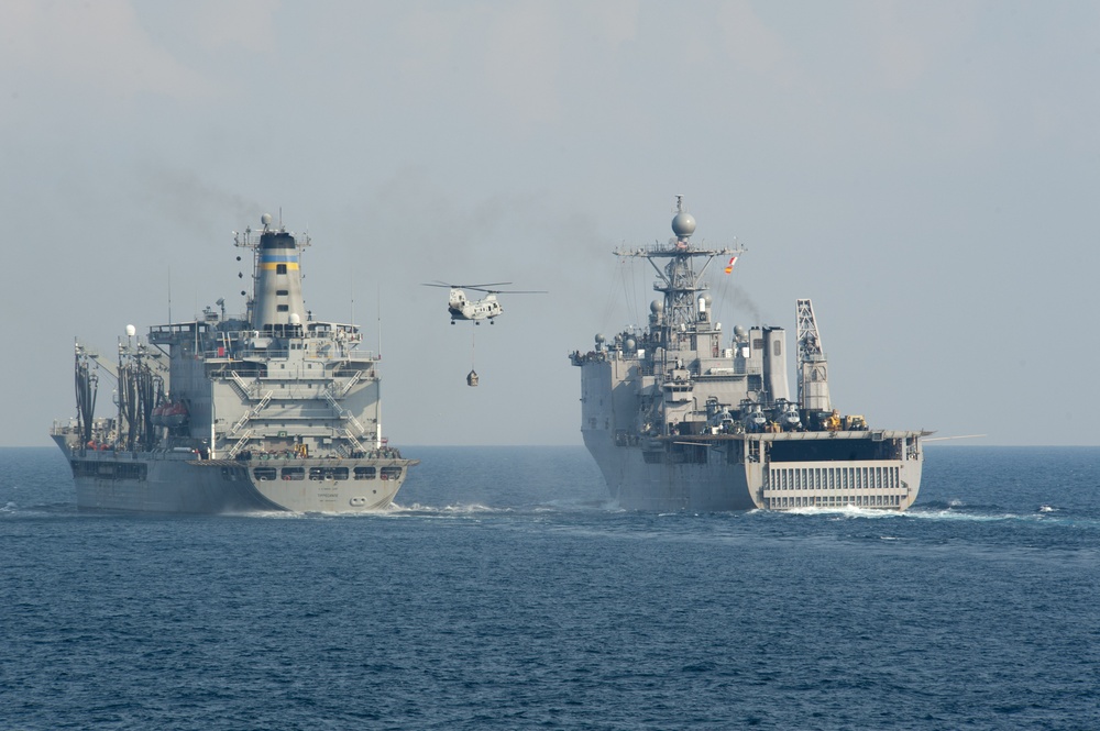 CH-46 Sea Knight carries supplies to USS Germantown