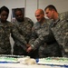 451st Soldiers cut cake to celebrate new patch