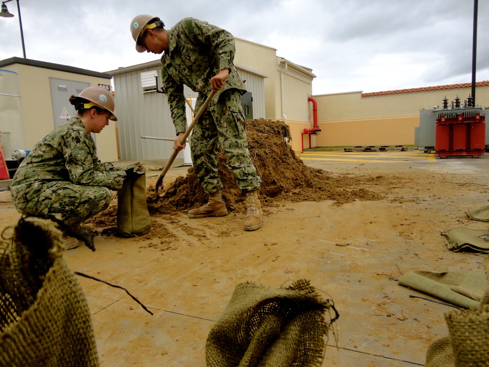 Seabees and sand bags fight flooding in Sigonella