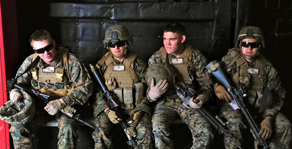 Marines wait during live-fire exercise