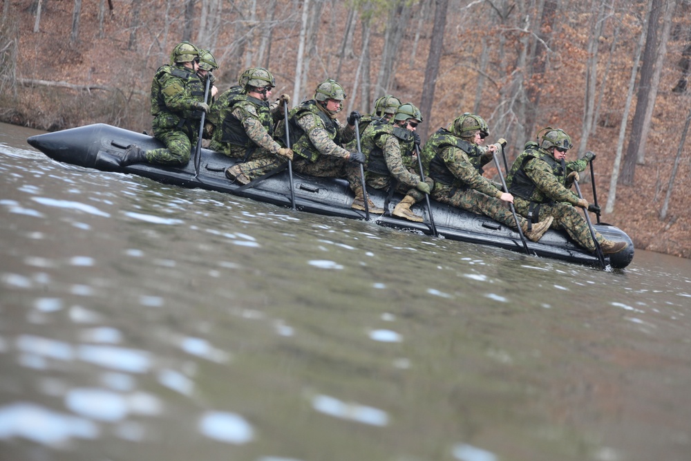 Two boot styles, one set of tracks: 2nd LAAD Marines train with Canadians