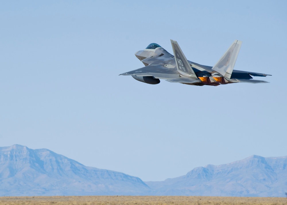 F-22 Raptors Take-Off