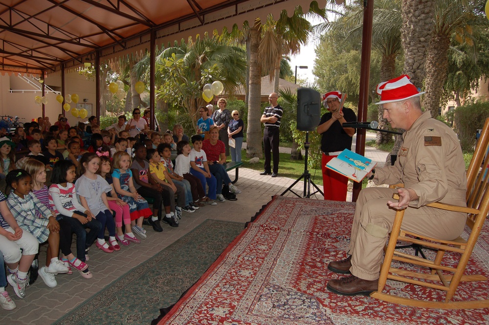 Commanding officer reads to children