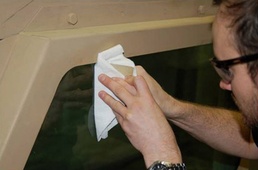 Glass laminate cover adapted by DLA saving money, protecting MRAP windows