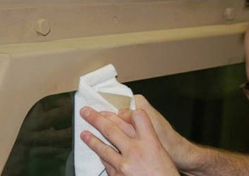 Glass laminate cover adapted by DLA saving money, protecting MRAP windows