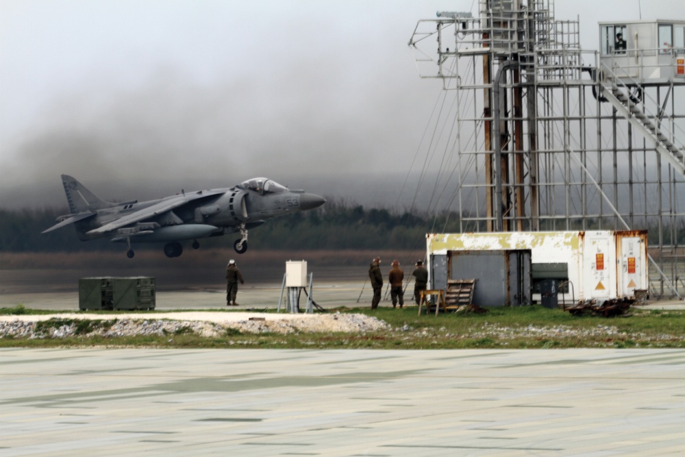 Bulk fuel Marines refuel Harriers on Ie Shima