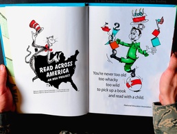 Airmen let loose, read books by Dr. Seuss