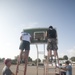 Ras Dika's basketball court receives a face-lift from US service members
