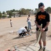 Ras Dika's basketball court receives a face-lift from US service members