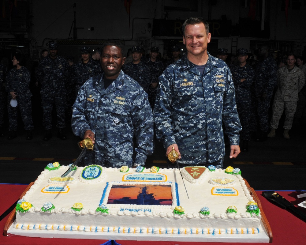 USS Makin Island sailors prep to cut cake