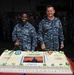 USS Makin Island sailors prep to cut cake