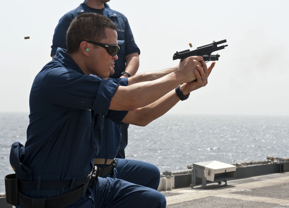 USS Cape St. George sailor fires pistol