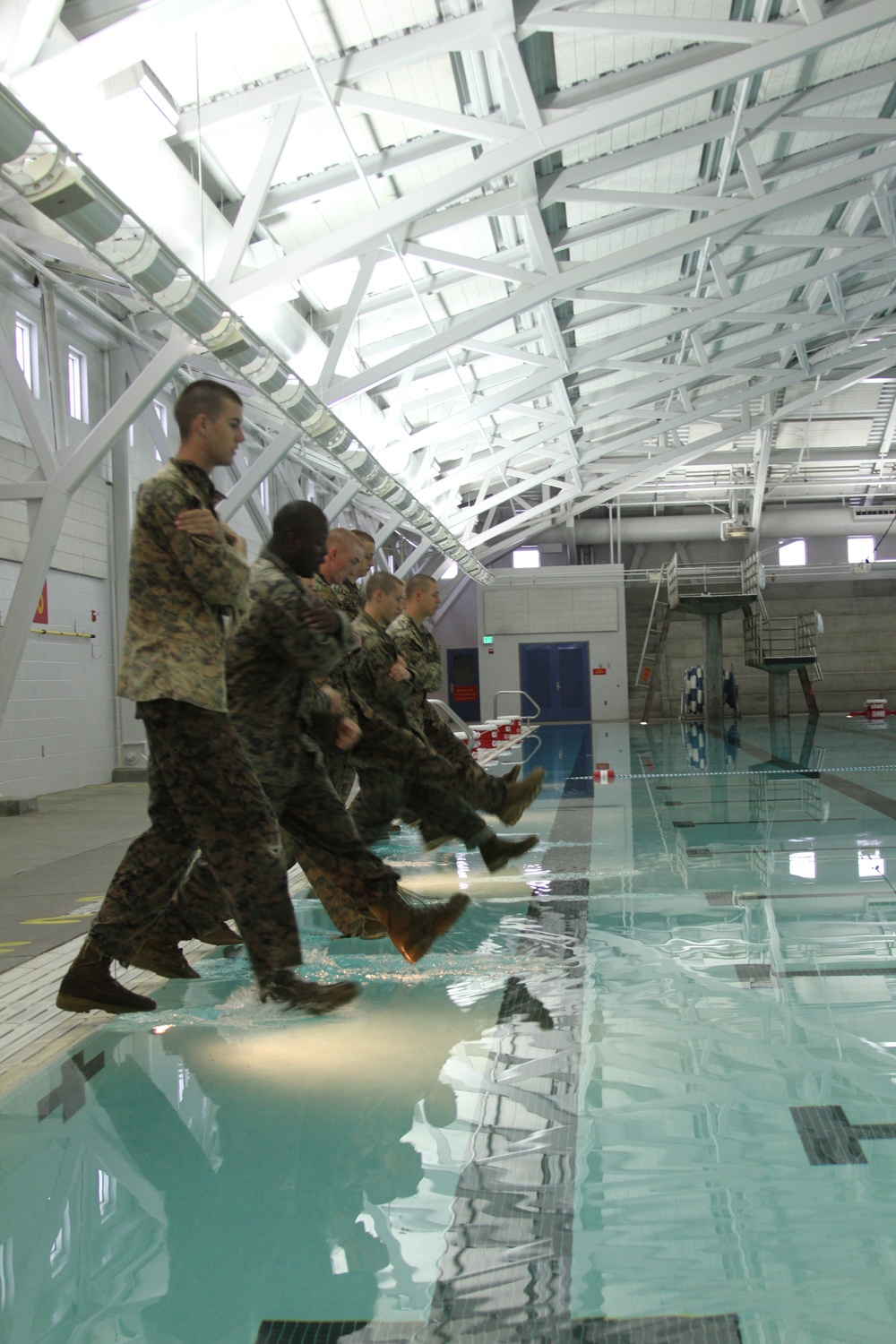 Company F recruits learn water survival skills