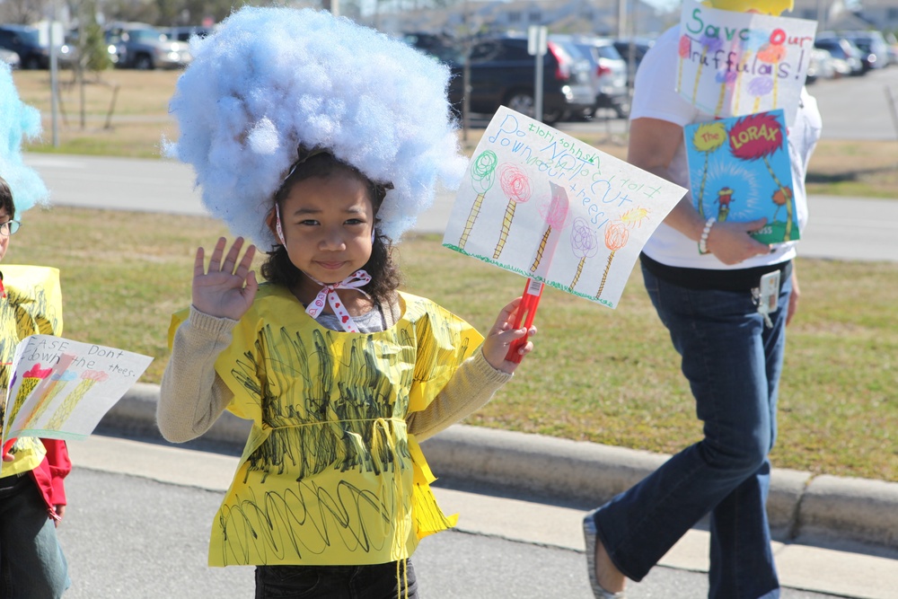 Children parade through Tarawa Terrace for Read Across America