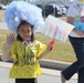 Children parade through Tarawa Terrace for Read Across America