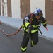 Navy civilian firefighters train for Firefighter Combat Challenge