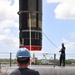 Loading a Tomahawk land attack missile onto USS Michigan