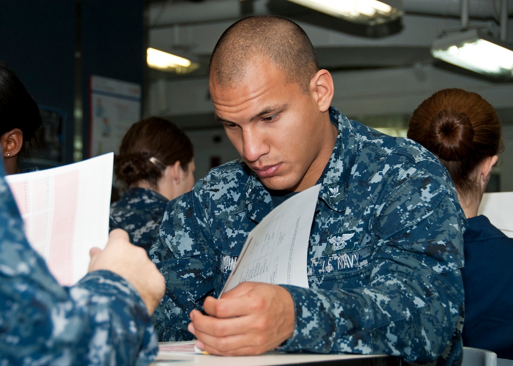 USS Enterprise sailor takes exam