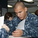 USS Enterprise sailor takes exam