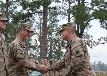 Sgt. Jason Briant, of Midwest City, Okla., receives a Bronze Star