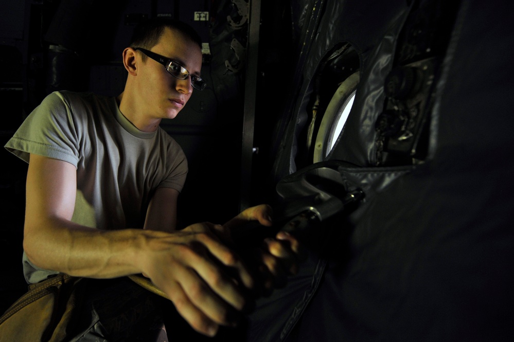 Airman rebuild a tornado damaged C-130