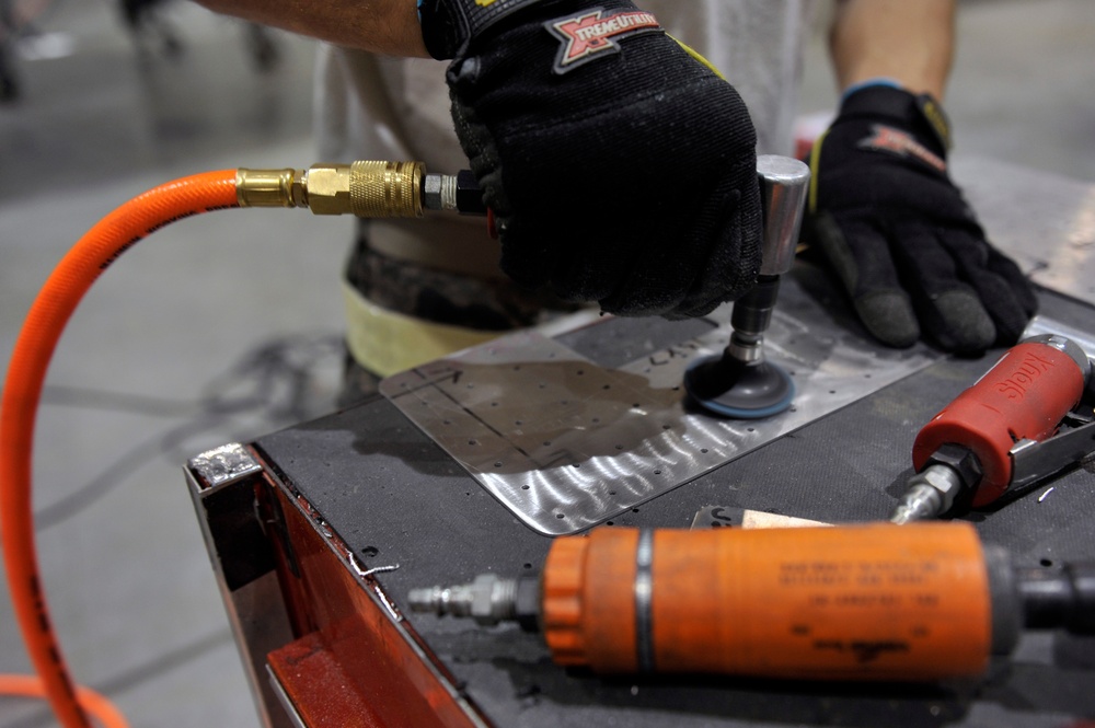 Airman rebuild a tornado damaged C-130
