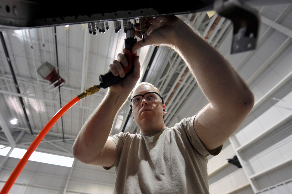 Airman rebuild a tornado damaged C-130