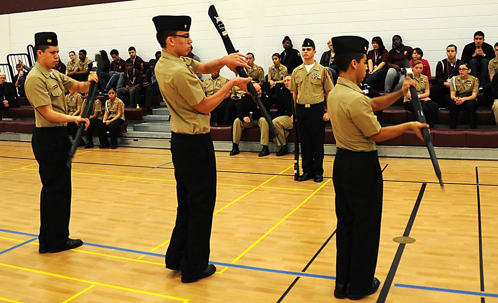 Navy JROTC unit performs unarmed and armed drill